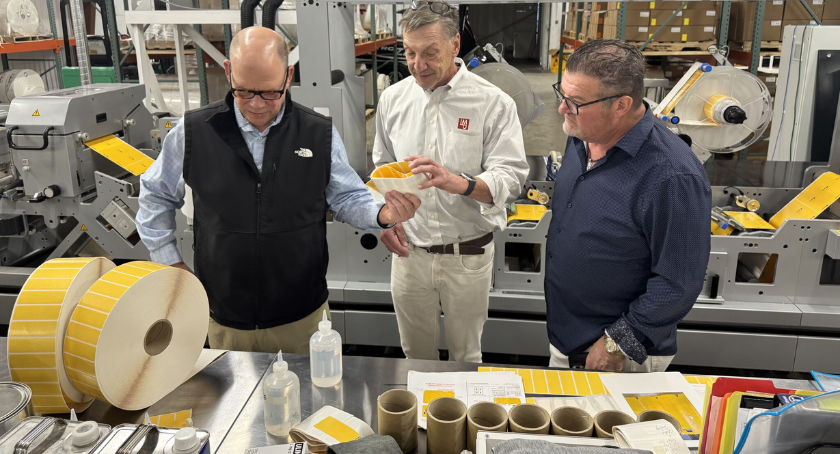 RFID labels have become essential to numerous industries, as Mark Davenport (L) shows here.